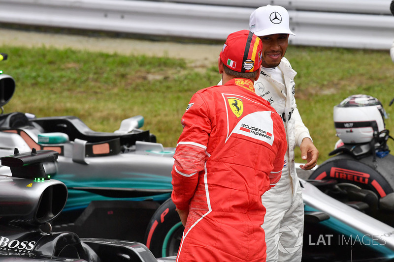 Sebastian Vettel, Ferrari y Lewis Hamilton, Mercedes AMG