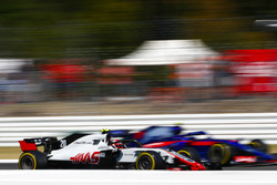 Kevin Magnussen, Haas F1 Team VF-18, and Pierre Gasly, Toro Rosso STR13