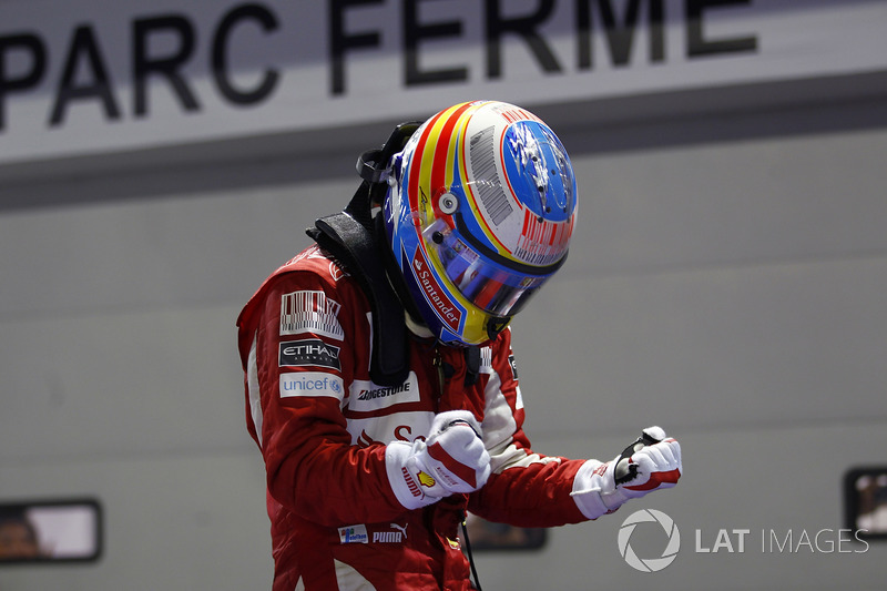 Ferrari’s last Grand Slam: Fernando Alonso celebrates victory at the Marina Bay Circuit, Singapore