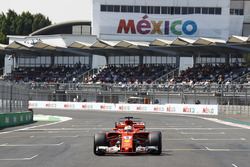 Sebastian Vettel, Ferrari SF70H, prepares to park his car after setting pole position