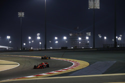 Kimi Raikkonen, Ferrari SF71H, leads Daniel Ricciardo, Red Bull Racing RB14 Tag Heuer
