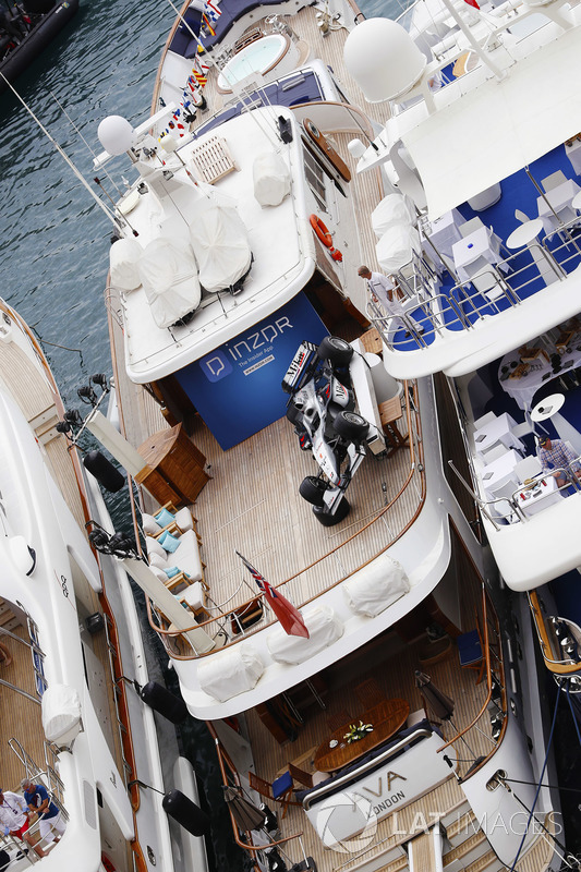 A vintage McLaren is parked on the INZDR yacht