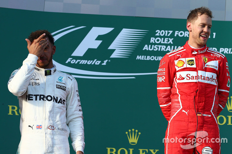 Podio: Sebastian Vettel, Ferrari, Lewis Hamilton, Mercedes AMG F1