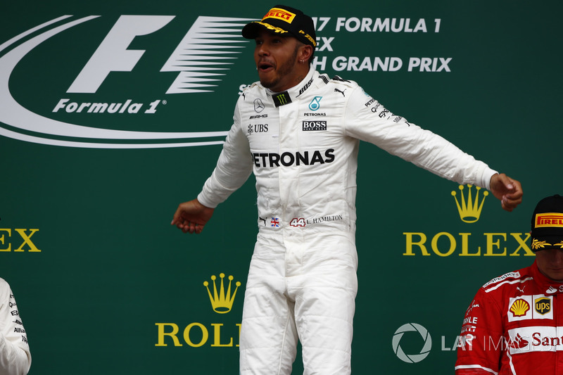 Race winner Lewis Hamilton, Mercedes AMG F1, celebrates victory on the podium