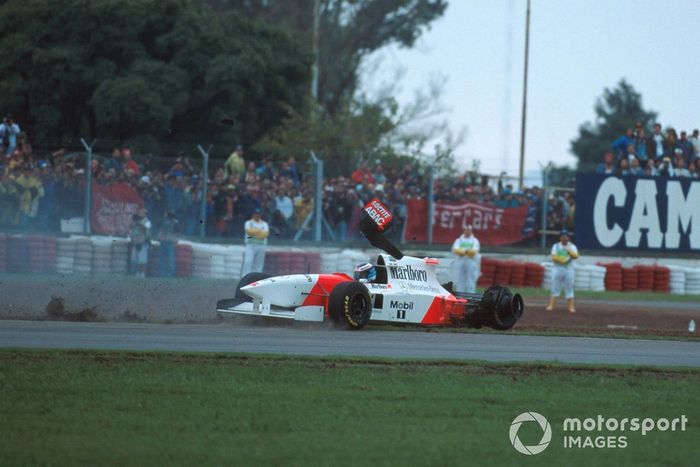 Mika Hakkinen, Mclaren  MP4-10 spins off after collision with Eddie Irvine