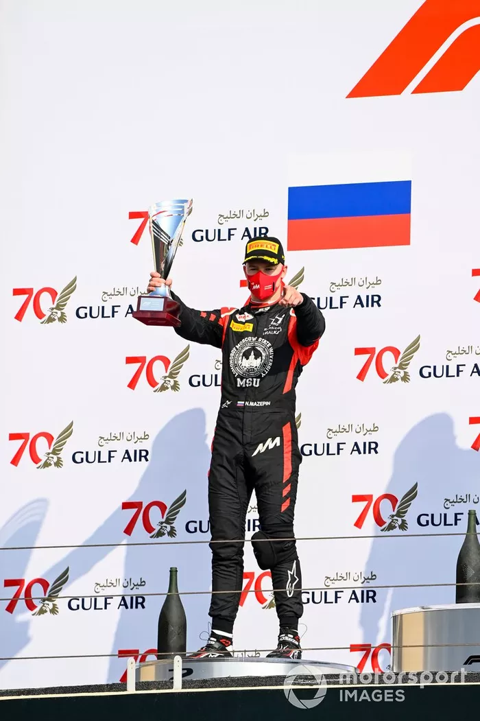 Nikita Mazepin, Hitech Grand Prix celebrates on the podium with the trophy