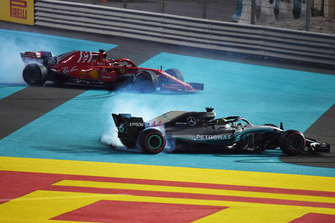 Lewis Hamilton, Mercedes-AMG F1 W09 and Sebastian Vettel, Ferrari SF71H donuts at the end of the race