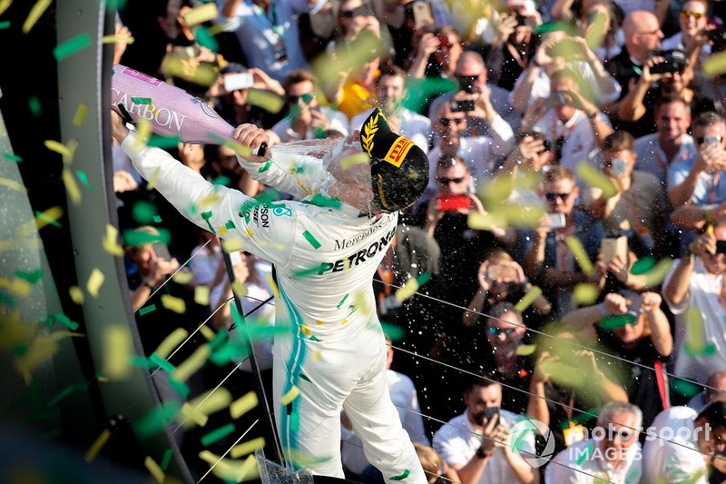 Valtteri Bottas, Mercedes AMG F1, 1st position, celebrates with Champagne on the podium