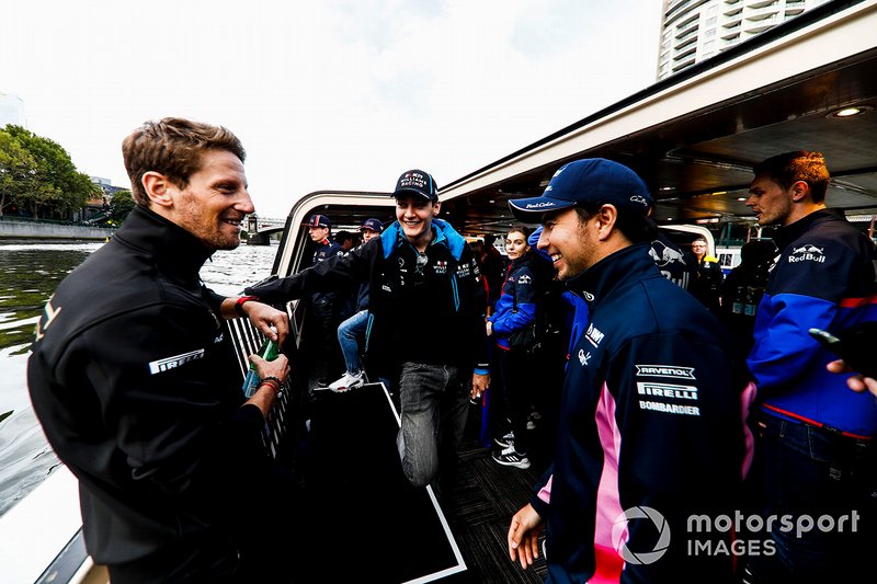 Romain Grosjean, Haas F1 Team, George Russell, Williams and Sergio Perez, Racing Point on the way to the Federation Square event