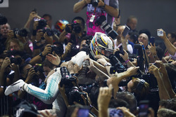 Lewis Hamilton, Mercedes AMG F1 crown surfs after winning the Singapore GP