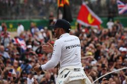 Race winner Lewis Hamilton, Mercedes AMG F1, celebrates a home race victory, the fans