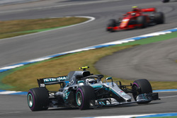 Valtteri Bottas, Mercedes AMG F1 W09, leads Kimi Raikkonen, Ferrari SF71H