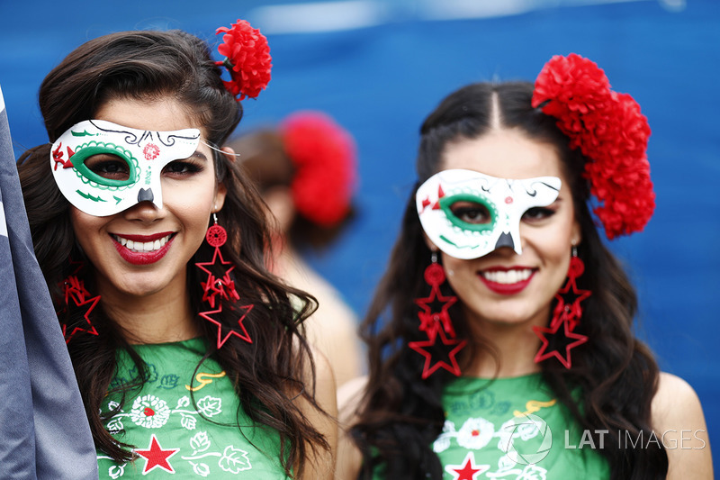 Grid girls wear local costume