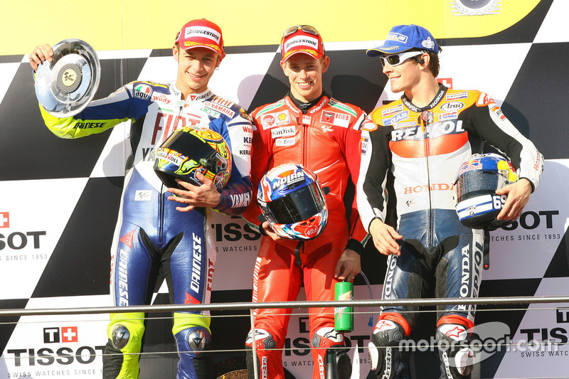 Podium: second place Valentino Rossi, Yamaha; Race winner Casey Stoner, Ducati; third place Nicky Hayden, Repsol Honda