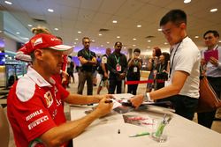 Sebastian Vettel, Ferrari signs autographs for the fans