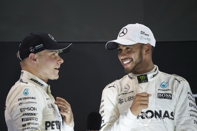 Podio: il secondo classificato Lewis Hamilton, Mercedes AMG F1, il vincitore della gara Valtteri Bot