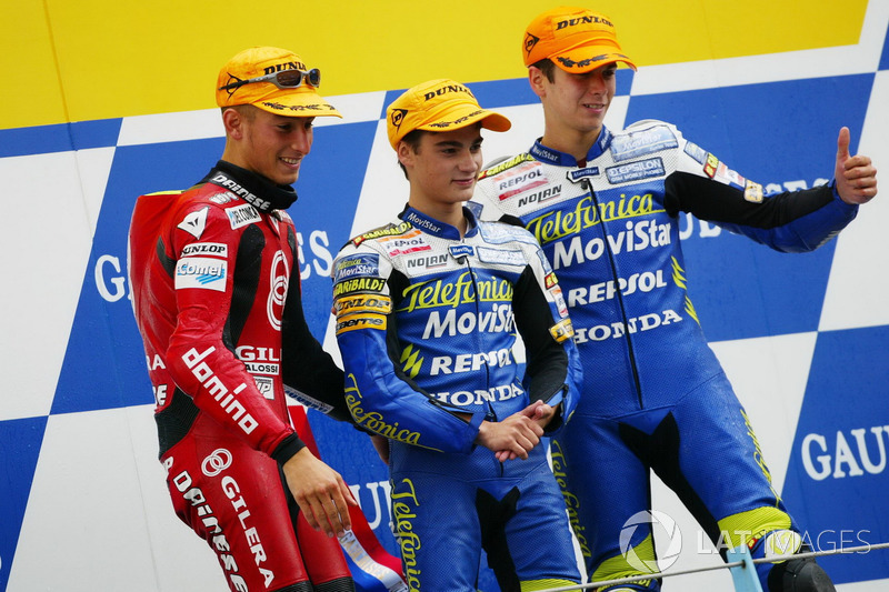 Podium: Racewinnaar Dani Pedrosa, tweede plaats Manuel Poggiali, derde plaats Joan Olive