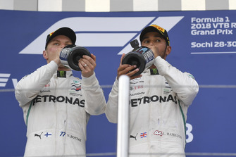 Valtteri Bottas, Mercedes AMG F1 and Lewis Hamilton, Mercedes AMG F1 with the champagne on the podium
