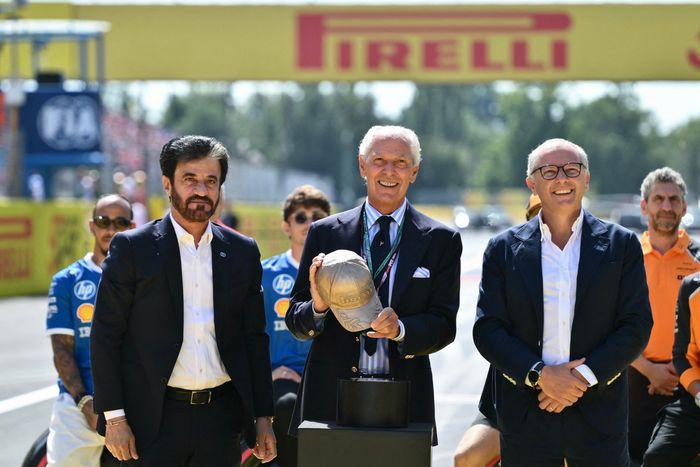 FIA president Mohammed Ben Sulayem (L), Pirelli CEO Marco Tronchetti Provera (C) and F1 CEO Stefano Domenicali (R) 