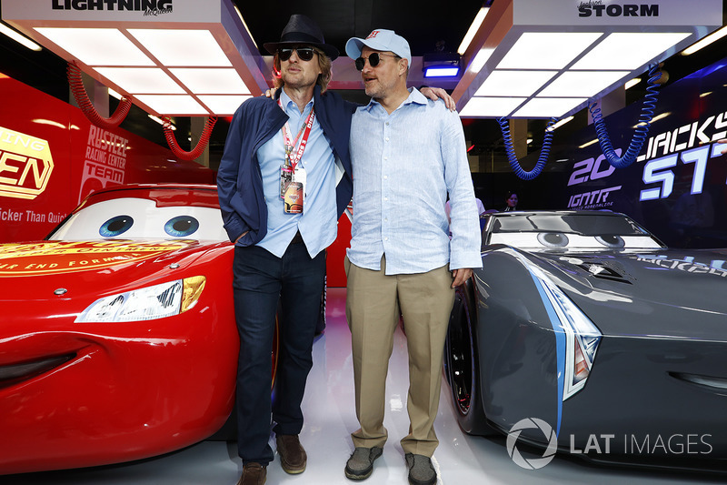 Actors Owen Wilson and Woody Harrelson in the Cars 3 promotional garage