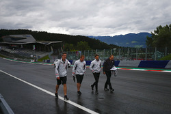 Romain Grosjean, Haas F1 Team, conducts a track walk with colleagues