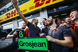 Romain Grosjean, Haas F1 Team, and the Haas F1 team celebrate the team's best finish yet