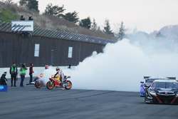 Marc Marquez, Dani Pedrosa, Repsol Honda Team perform burnouts with Honda NSX Super GT cars