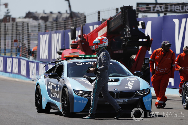 Nelson Piquet Jr., Jaguar Racing, climbs into the BMW i8 Safety Car after crashing