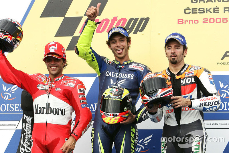 Podium: race winner Valentino Rossi, Yamaha, second place Loris Capirossi, Ducati, third place Max Biaggi, Honda