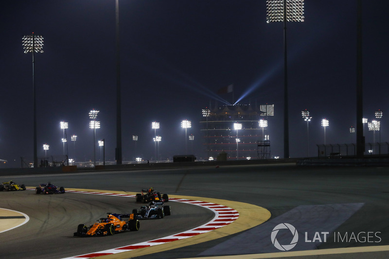 Fernando Alonso, McLaren MCL33 Renault, leads Lewis Hamilton, Mercedes AMG F1 W09, and Max Verstappen, Red Bull Racing RB14 Tag Heuer