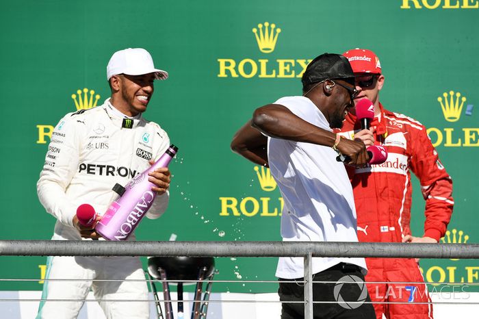 Podio: ganador de la carrera Lewis Hamilton, Mercedes AMG F1 y Usain Bolt, tercer lugar Kimi Raikkonen, Ferrari