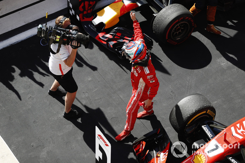Kimi Raikkonen, Ferrari SF71H, celebrates in Parc Ferme after winning the race.