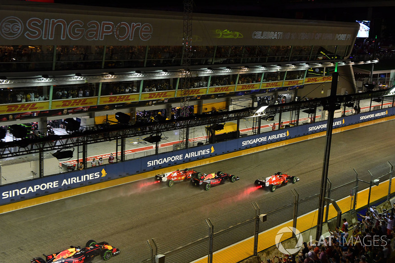 Sebastian Vettel, Ferrari SF70H, Max Verstappen, Red Bull Racing RB13 and Kimi Raikkonen, Ferrari SF70H crash at the start of the race