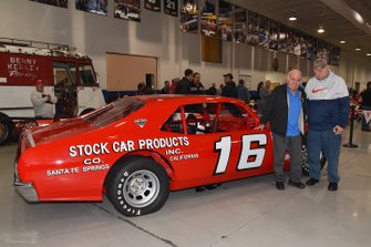 NHOF driver Jerry Cook stands next to Butch Lindley car