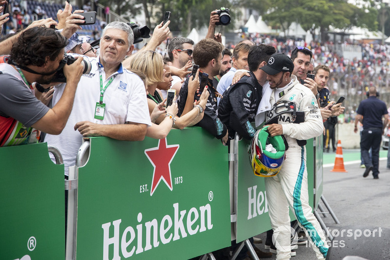 Lewis Hamilton, Mercedes AMG F1 celebrates in Parc Ferme with his mechanics 