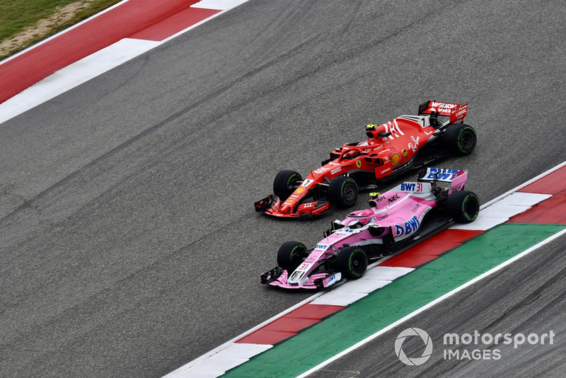 Kimi Raikkonen, Ferrari SF71H and Esteban Ocon, Racing Point Force India VJM11