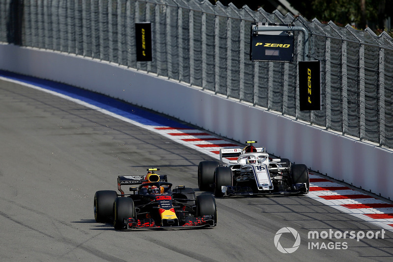Max Verstappen, Red Bull Racing RB14 and Charles Leclerc, Sauber C37