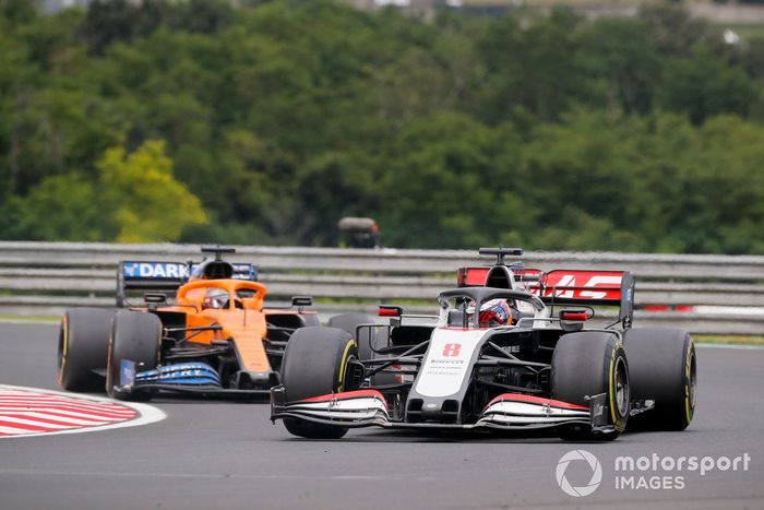 Romain Grosjean, Haas VF-20, Carlos Sainz Jr., McLaren MCL35