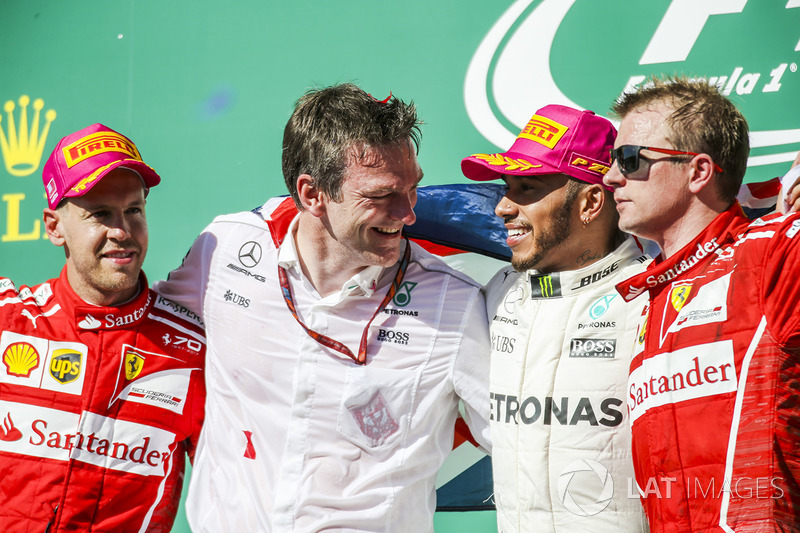 Race winner Lewis Hamilton, Mercedes AMG F1 celebrates on the podium alongside James Allison, Merced