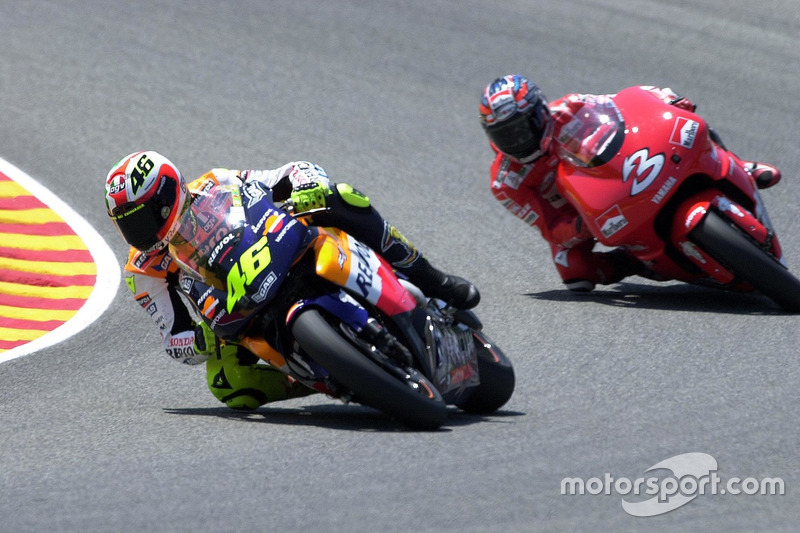 Valentino Rossi, Repsol Honda Team; Max Biaggi, Yamaha