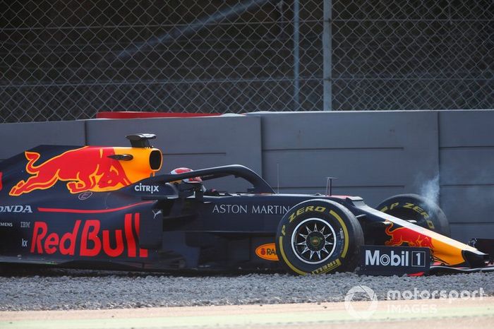 Pierre Gasly, Red Bull Racing RB15 in the gravel after crashing into the barrier