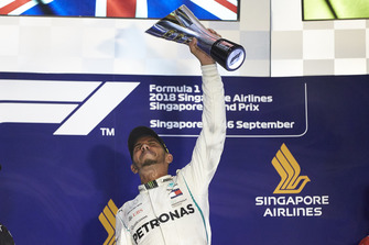 Lewis Hamilton, Mercedes AMG F1, 1st position, lifts his trophy on the podium