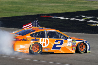 Brad Keselowski, Team Penske, Ford Fusion Autotrader celebrates his win with a burnout