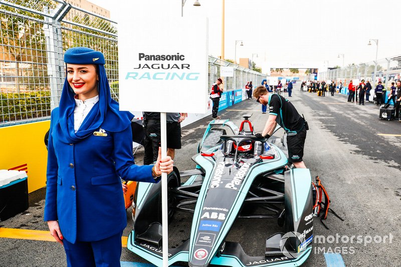 The Saudia Airlines representative holding the grid sign for Mitch Evans, Panasonic Jaguar Racing, Jaguar I-Type 3