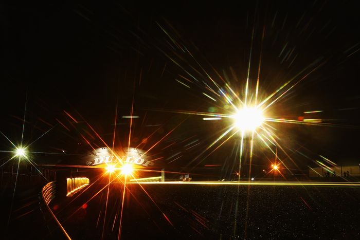 Cars run under the Dunlop Bridge