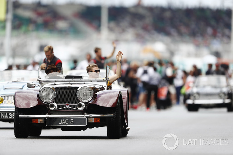 Nico Hulkenberg, Renault Sport F1 Team, waves from a Panther J72 on the drivers parade