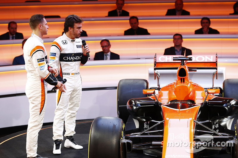 Fernando Alonso, McLaren, and team-mate Stoffel Vandoorne, discuss the MCL32 on stage