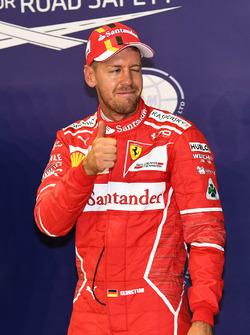 Pole sitter Sebastian Vettel, Ferrari celebrates in parc ferme