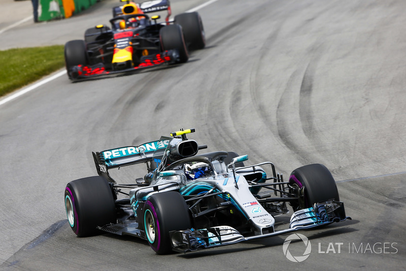Valtteri Bottas, Mercedes AMG F1 W09, leads Max Verstappen, Red Bull Racing RB14