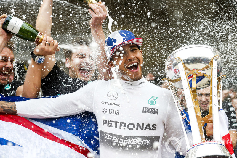 Lewis Hamilton, Mercedes AMG, celebrates after securing a third World Drivers Championship victory